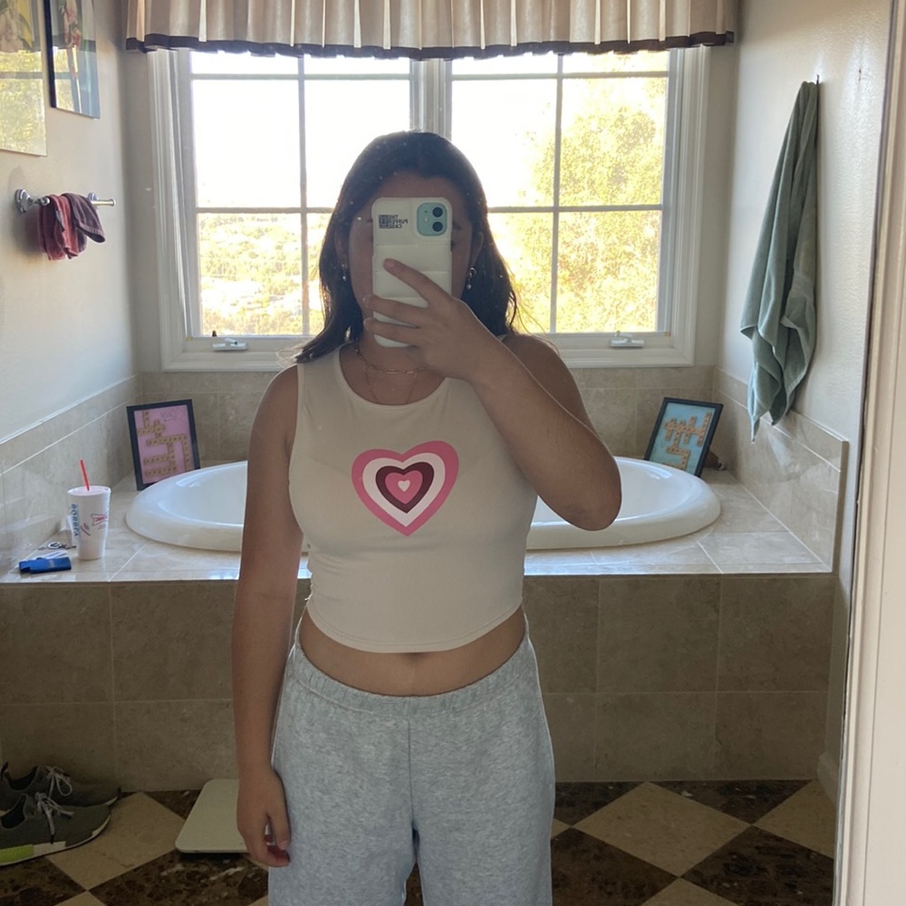 beige tank top with pink heart